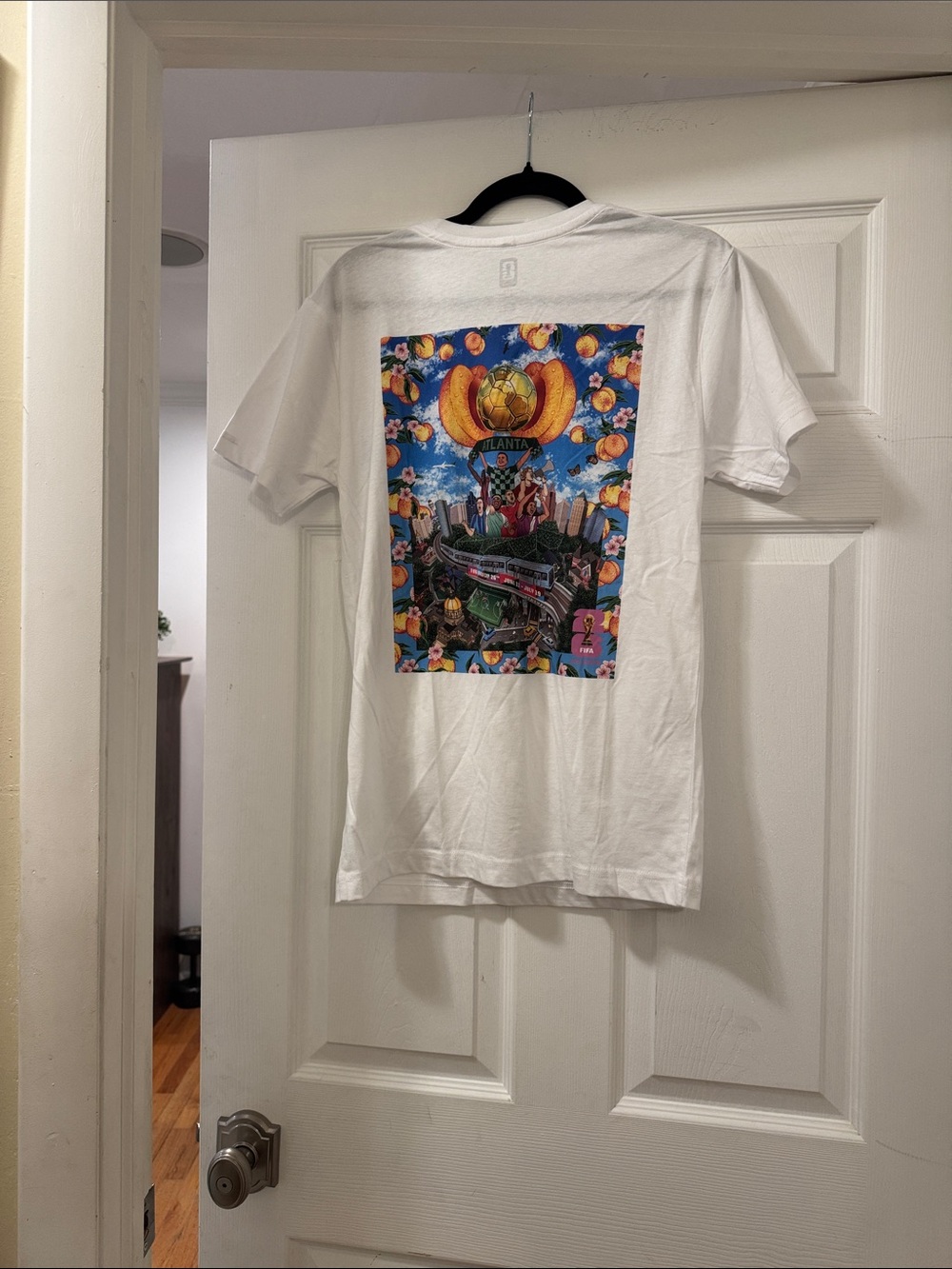 White Graphic Men’s T‑Shirt with Colorful Back Print